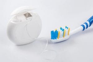 brushing and flossing at home